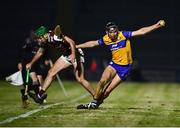 8 February 2025; Cathal Malone of Clare evades the tackle of Brian Concannon of Galway during the Allianz Hurling League Division 1A match between Galway and Clare at Pearse Stadium in Galway. Photo by Tyler Miller/Sportsfile
