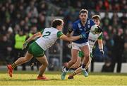 8 February 2025; Graham O'Sullivan of Kerry is tackled by Finnbarr Roarty of Donegal during the Allianz Football League Division 1 match between Kerry and Donegal at Fitzgerald Stadium in Killarney, Kerry. Photo by Brendan Moran/Sportsfile
