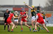 9 February 2025; Tom Doyle of Kerry in action against Derry players, from left, Ryan McGill, Thomas Brady and Sean Cassidy during the Allianz Hurling League Division 2 match between Kerry and Derry at Austin Stack Park in Tralee, Kerry. Photo by Brendan Moran/Sportsfile