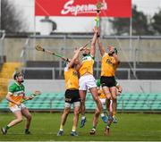 9 February 2025; Killian Sampson of Offaly in action against Scott Walsh and Paul Boyle of Antrim during the Allianz Hurling League Division 1B match between Offaly and Antrim at Glenisk O'Connor Park in Tullamore, Offaly. Photo by Matt Browne/Sportsfile