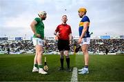 9 February 2025; Referee Chris Mooney with Limerick captain Cian Lynch, left, and Tipperary captain Ronan Maher before the Allianz Hurling League Division 1A match between Limerick and Tipperary at TUS Gaelic Grounds in Limerick. Photo by Seb Daly/Sportsfile