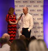 7 February 2025; Shane Doherty from the Sacred Heart School in Clondalkin, Dublin, winner of the School Coach of the Year award is interviewed by MC Gráinne McElwain at the 2024 LGFA National Volunteer of the Year awards ceremony at Croke Park in Dublin. Photo by Piaras Ó Mídheach/Sportsfile