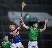 9 February 2025; Dylan Lynch of Limerick in action against Ronan Maher of Tipperary during the Allianz Hurling League Division 1A match between Limerick and Tipperary at TUS Gaelic Grounds in Limerick. Photo by Seb Daly/Sportsfile