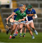 9 February 2025; Adam English of Limerick in action against Robert Doyle of Tipperary during the Allianz Hurling League Division 1A match between Limerick and Tipperary at TUS Gaelic Grounds in Limerick. Photo by Seb Daly/Sportsfile