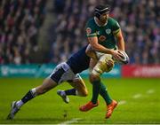 9 February 2025; Caelan Doris of Ireland is tackled by Jamie Dobie of Scotland during the Guinness Six Nations Rugby Championship match between Scotland and Ireland at Scottish Gas Murrayfield Stadium in Edinburgh, Scotland. Photo by Ramsey Cardy/Sportsfile