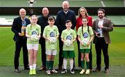 12 February 2025; Pictured, from left, FAI Commercial Director Sean Kavanagh; Kevin Donnelly, Managing Director, Britvic Ireland; Stephen Cramp, Marketing Director, Britvic Ireland; Dee Cunniam, Head of Brand Marketing & Innovation, Britvic Ireland; and FAI grassroots director Ger McDermott. Front row, from left, Sophia Kenna, Tyler Waine, Dylan Kenna and Abbie Halpin at the Aviva Stadium, to mark the kick-off of a five-year partnership between MiWadi and Football Association Ireland. MiWadi will become the title sponsor of the largest summer grassroots programme in the country. Photo by Ramsey Cardy/Sportsfile