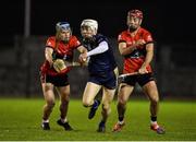 11 February 2025; Cillian Dunne of DCU in action against Cathal McCarthy and William Buckley of UCC during the Electric Ireland HE GAA Fitzgibbon Cup semi-final match between University College Cork and Dublin City University Dóchas Éireann at SETU Carlow Campus in Carlow. Photo by Matt Browne/Sportsfile