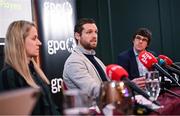 12 February 2025; GPA chief executive officer Tom Parsons, centre, addresses attendees at The Alex Hotel in Dublin, alongside GPA head of equality and player relations Gemma Begley, left, and Indecon economist and partner Hugh Hennessy, right, during the launch of an independent report, carried out by Indecon International Economic and Strategic Consultants, into the economic impact of inter-county Gaelic games. Photo by Seb Daly/Sportsfile
