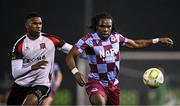 31 January 2025; Thomas Oluwa of Drogheda United in action against Mayowa Animasahun of Dundalk during the Jim Malone Cup match between Dundalk and Drogheda United at Oriel Park in Dundalk, Louth. Photo by Piaras Ó Mídheach/Sportsfile