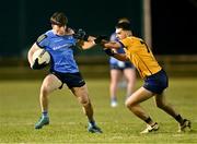 12 February 2025; Daire Cregg of UCD in action against Ciarán Caulfield of DCU during the Electric Ireland Higher Education GAA Sigerson Cup final match between UCD and DCU DÉ at the GAA Connacht Centre of Excellence in Bekan, Mayo. Photo by Piaras Ó Mídheach/Sportsfile