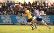 12 February 2025; Ronan Gallagher of DCU in action against Luke Breathnach of UCD during the Electric Ireland Higher Education GAA Sigerson Cup final match between UCD and DCU DÉ at the GAA Connacht Centre of Excellence in Bekan, Mayo. Photo by Piaras Ó Mídheach/Sportsfile