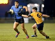 12 February 2025; Theo Clancy of UCD in action against Ronan Gallagher of DCU during the Electric Ireland Higher Education GAA Sigerson Cup final match between UCD and DCU DÉ at the GAA Connacht Centre of Excellence in Bekan, Mayo. Photo by Piaras Ó Mídheach/Sportsfile