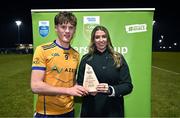 12 February 2025; Sarah Gelletlie, Sponsorship Manager, Electric Ireland, presents the Electric Ireland player of the match award to Ethan Dunne of DCU after his side's victory in the Electric Ireland Higher Education GAA Sigerson Cup final match between UCD and DCU DÉ at the GAA Connacht Centre of Excellence in Bekan, Mayo. Photo by Piaras Ó Mídheach/Sportsfile
