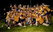 12 February 2025; DCU captain Ciarán Caulfield with the cup as he celebrates with team-mates after their side's victory in the Electric Ireland Higher Education GAA Sigerson Cup final match between UCD and DCU DÉ at the GAA Connacht Centre of Excellence in Bekan, Mayo. Photo by Piaras Ó Mídheach/Sportsfile