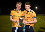 12 February 2025; DCU players Niall Dolan, left, and Conor Heffernan with the cup after their side's victory in the Electric Ireland Higher Education GAA Sigerson Cup final match between UCD and DCU DÉ at the GAA Connacht Centre of Excellence in Bekan, Mayo. Photo by Piaras Ó Mídheach/Sportsfile