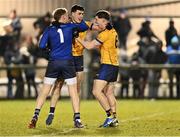 12 February 2025; DCU players, from left, Eoin McGuinness, Ryan Donoghue and Ronan Gallagher celebrate after the Electric Ireland Higher Education GAA Sigerson Cup final match between UCD and DCU DÉ at the GAA Connacht Centre of Excellence in Bekan, Mayo. Photo by Piaras Ó Mídheach/Sportsfile