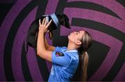 28 January 2025; Amber Cosgrove with her dog Cleo, a miniature dachshund, during a DLR Waves FC squad portraits session at Beckett Park in Cherrywood, Dublin. Photo by Stephen McCarthy/Sportsfile