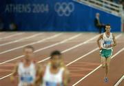 28 August 2004; Ireland's Alastair Cragg (2129) trails the field during the Final of the Men's 5000m. Olympic Stadium. Games of the XXVIII Olympiad, Athens Summer Olympics Games 2004, Athens, Greece. Picture credit; Brendan Moran / SPORTSFILE