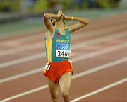 28 August 2004; Morocco's Hicham El Guerrouj celebrates after winning Gold in the Final of the Men's 5000m. Olympic Stadium. Games of the XXVIII Olympiad, Athens Summer Olympics Games 2004, Athens, Greece. Picture credit; Brendan Moran / SPORTSFILE