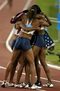 28 August 2004; The members of the USA team celebrate winning Gold in the Women's 4 x 400m FInal. Olympic Stadium. Games of the XXVIII Olympiad, Athens Summer Olympics Games 2004, Athens, Greece. Picture credit; Brendan Moran / SPORTSFILE