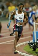 28 August 2004; Darold Williamson runs the anchor leg on their way to winning Gold for the USA in the Men's 4 x 400m Final. Olympic Stadium. Games of the XXVIII Olympiad, Athens Summer Olympics Games 2004, Athens, Greece. Picture credit; Brendan Moran / SPORTSFILE