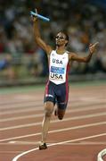 28 August 2004; Darold Williamson crosses the finishline to win Gold for the USA in the Men's 4 x 400m Final. Olympic Stadium. Games of the XXVIII Olympiad, Athens Summer Olympics Games 2004, Athens, Greece. Picture credit; Brendan Moran / SPORTSFILE