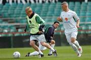 3 September 2004; Damien Duff, Republic of Ireland, in action against his team-mates Graham Kavanagh, right, and Andy Reid, during squad training. Lansdowne Road, Dublin. Picture credit; David Maher / SPORTSFILE
