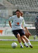 3 September 2004; Robbie Keane, Republic of Ireland, in action against his team-mate Kenny Cunningham during squad training. Lansdowne Road, Dublin. Picture credit; David Maher / SPORTSFILE