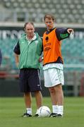3 September 2004; Kenny Cunningham, Republic of Ireland, with his manager Brian Kerr, during squad training. Lansdowne Road, Dublin. Picture credit; David Maher / SPORTSFILE