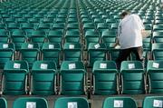 3 September 2004; Brian Lawless, from Swords, applies seat numbers to the temporary seats which are being used for the Republic of Ireland v Cyprus World Cup Qualifying match tommorrow, Lansdowne Road, Dublin. Picture credit; Brian Lawless / SPORTSFILE