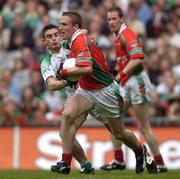 28 August 2004; David Heaney, Mayo, in action against Fermanagh's Colm Bradley. Bank of Ireland Senior Football Championship Semi-Final Replay, Mayo v Fermanagh, Croke Park, Dublin.  Picture credit; Brian Lawless / SPORTSFILE