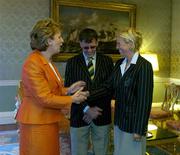 1 September 2004; President of Ireland, Mary McAleese greets Irish dressage rider Heike Holstein, in the company of Irish Chef de Mission Willie O'Brien, at a reception, held in Aras an Uachtarain, in honour of the Irish Olympic team's achievements at the 2004 Olympic Games in Athens recently. Picture credit; Brendan Moran / SPORTSFILE