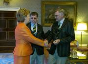 1 September 2004; President of Ireland, Mary McAleese greets Irish team doctor Dr. Sean Gaine, in the company of Irish Chef de Mission Willie O'Brien, at a reception, held in Aras an Uachtarain, in honour of the Irish Olympic team's achievements at the 2004 Olympic Games in Athens recently. Picture credit; Brendan Moran / SPORTSFILE