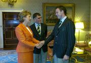 1 September 2004; President of Ireland, Mary McAleese greets Irish boxer Andy Lee, in the company of Irish Chef de Mission Willie O'Brien, at a reception, held in Aras an Uachtarain, in honour of the Irish Olympic team's achievements at the 2004 Olympic Games in Athens recently. Picture credit; Brendan Moran / SPORTSFILE