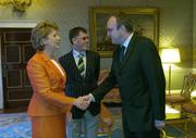 1 September 2004; President of Ireland, Mary McAleese greets Paul McDermott of the Irish Sports Council, in the company of Irish Chef de Mission Willie O'Brien, at a reception, held in Aras an Uachtarain, in honour of the Irish Olympic team's achievements at the 2004 Olympic Games in Athens recently. Picture credit; Brendan Moran / SPORTSFILE