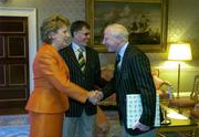 1 September 2004; President of Ireland, Mary McAleese greets President of the Olympic Council of Ireland Pat Hickey, in the company of Irish Chef de Mission Willie O'Brien, at a reception, held in Aras an Uachtarain, in honour of the Irish Olympic team's achievements at the 2004 Olympic Games in Athens recently. Picture credit; Brendan Moran / SPORTSFILE