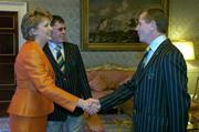 1 September 2004; President of Ireland, Mary McAleese greets Irish athletics team manager Michael Quinlan, in the company of Irish Chef de Mission Willie O'Brien, at a reception, held in Aras an Uachtarain, in honour of the Irish Olympic team's achievements at the 2004 Olympic Games in Athens recently. Picture credit; Brendan Moran / SPORTSFILE