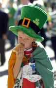 4 September 2004; Republic of Ireland fan Paul Grover, age 11, from Dundalk, has a snack before the game. FIFA World Cup Qualifier, Republic of Ireland v Cyprus, Lansdowne Road, Dublin. Picture credit; Brendan Moran / SPORTSFILE