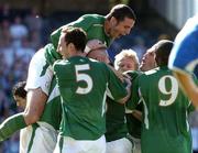4 September 2004; Andy Reid, hidden, Republic of Ireland, celebrates after scoring his sides second goal with team-mates left tor right, Andy O'Brien, Graham Kavanagh, John O'Shea, Damien Duff, Robbie Keane and Clinton Morrison.  FIFA World Cup Qualifier, Republic of Ireland v Cyprus, Lansdowne Road, Dublin. Picture credit; David Maher / SPORTSFILE