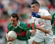 5 September 2004; Damian Munnelly, Mayo, in action against Andrew McLoughlin, Kildare. Erin All-Ireland U21 Football Championship Semi-Final, Mayo v Kildare, Pearse Stadium, Galway. Picture credit; David Maher / SPORTSFILE
