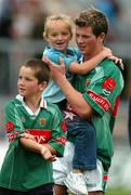 5 September 2004; Trevor Howley, Mayo, celebrates at the end of the game with young supporters after victory over Kildare. Erin All-Ireland U21 Football Championship Semi-Final, Mayo v Kildare, Pearse Stadium, Galway. Picture credit; David Maher / SPORTSFILE