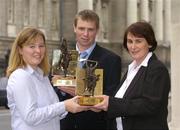 6 September 2004; Deirdre Delaney, who collected the award on behalf of her brother Kilkenny hurler JJ, and Tomas O Se, Kerry footballer, who were presented with the Vodafone Player of the Month awards for August by Carolan Lennon, Head of Marketing, Vodafone, right. Westin Hotel, Dublin. Picture credit; Ray McManus / SPORTSFILE