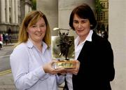 6 September 2004;  Deirdre Delaney, who collected the award on behalf of her brother JJ, who who presented with the Vodafone Player of the Month award for August by Carolan |Lennon, Head of Marketing, Vodafone, right. Westin Hotel, Dublin. Picture credit; Ray McManus / SPORTSFILE