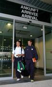 6 September 2004; Roy Keane, Republic of Ireland, with team-mate Graham Kavanagh arrive at the euro airport  Basel, ahead of their forthcoming 2006 World Cup Qualifying Game with Switzerland. Basel, Switzerland. Picture credit; David Maher / SPORTSFILE