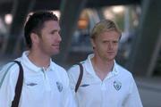 6 September 2004; Damien Duff, right, Republic of Ireland,  with team-mate Robbie Keane arrives at the euro airport, Basel, ahead of their forthcoming 2006 World Cup Qualifying Game with Switzerland. Basel, Switzerland. Picture credit; Brian Lawless/ SPORTSFILE