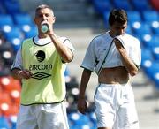 7 September 2004; Roy Keane, Republic of Ireland, with team-mate Graham Kavanagh, left, during squad training. St. Jakob Park, Basle, Switzerland. Picture credit; David Maher / SPORTSFILE