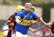 28 August 2004; Tommy Fitzgerald, Tipperary, in action against Paddy Hughes, Down. Erin All-Ireland U21 Hurling Championship Semi-Final, Tipperary v Down, O'Moore Park, Portlaoise, Co. Laois.  Picture credit; Matt Browne / SPORTSFILE