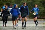 30 September 2013; Leinster players from left, Brian O'Driscoll, Quinn Roux, Devin Toner and Eoin Reddan arrive for squad training ahead of their Celtic League 2013/14 Round 5 game against Munster on Saturday. Leinster Rugby Squad Training & Press Briefing, Rosemount, UCD, Belfield, Dublin.  Picture credit: Barry Cregg / SPORTSFILE