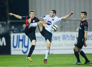 30 September 2013; Kurtis Byrne, Dundalk, in action against Simon Madden, Derry City. Airtricity League Premier Division, Dundalk v Derry City, Oriel Park, Dundalk, Co. Louth. Photo by Sportsfile