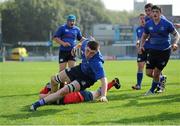 28 September 2013; Conor Hand, Leinster, is tackled by Michael Casey, Munster, to score his side's second try. Under 18 Club Interprovincial, Leinster v Munster, Donnybrook Stadium, Donnybrook, Dublin. Picture credit: Barry Cregg / SPORTSFILE